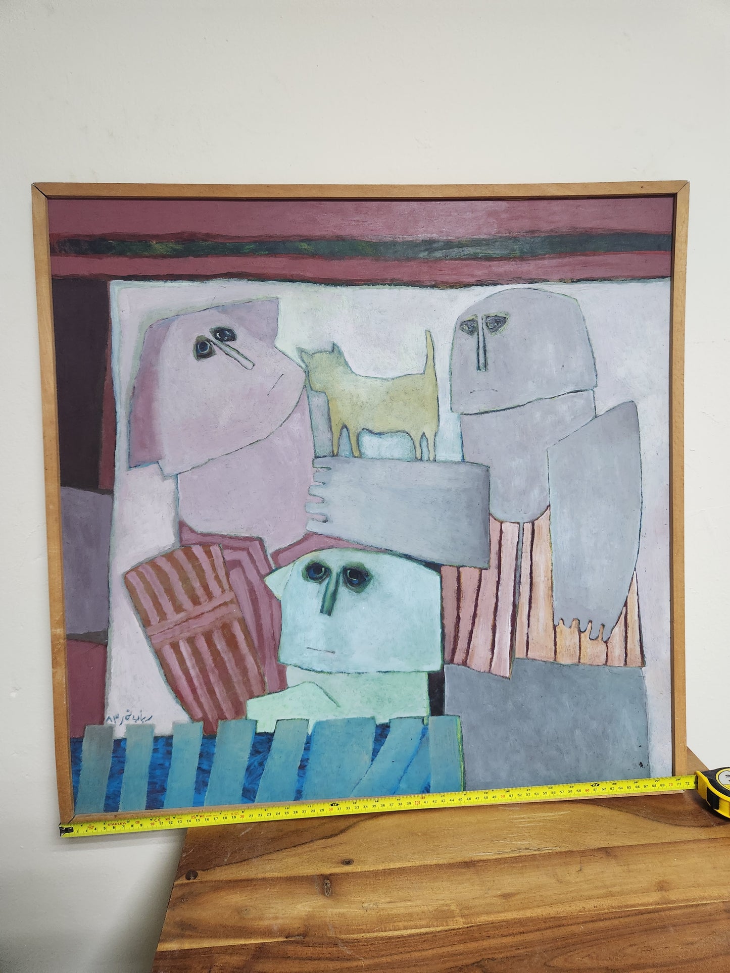 Rabab Nemr, Three Figures with a Cat, 1986 — signed oil on canvas, framed, approx. 72 x 72 cm, shown with tape measure