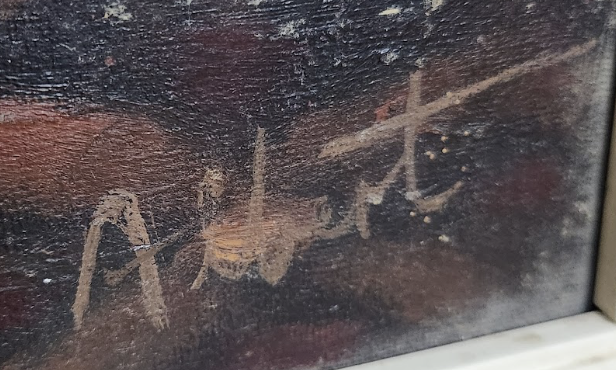 Signature detail in the lower right corner of the Orientalist oil portrait, indistinct and unattributed